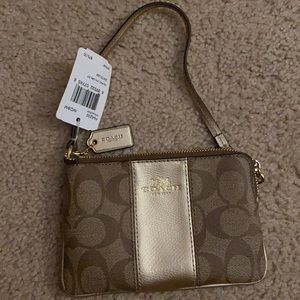Tan and Gold Coach wristlet